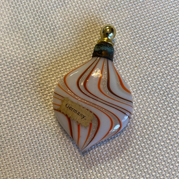 Tiny antique lay down perfume bottle